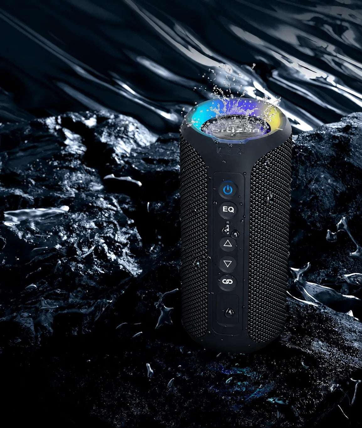 Black portable speaker standing upright in a water-splash setting.