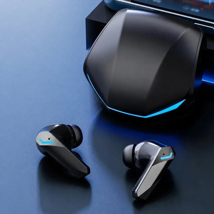 Close-up of black GM2 Pro earbuds beside the charging case.